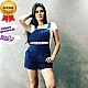 Jardineira Short em Jeans Jardineira Short em Jeans